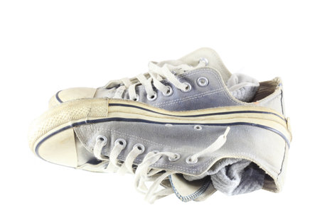 old sneakers on white background  の写真素材