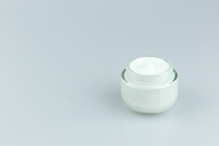 Facial Cream packaging on white background.の写真素材