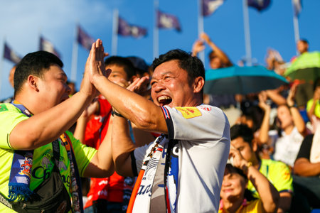 Suphanburi, Thailand - July 01, 2018 : Fan club of Suphanburi Football club emotion in Thailand Soccer league between competition With Navy Football clubのeditorial素材