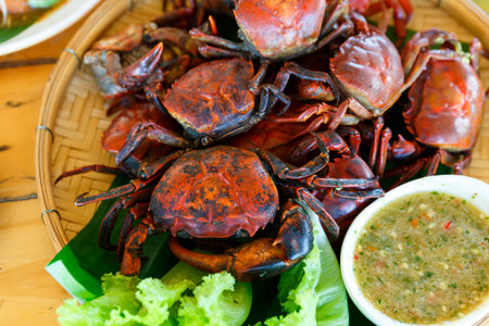 Thai field crab grilled with spicy sauce.