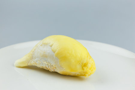 Single Durian on white plate, King of fruit of Thailand.の写真素材