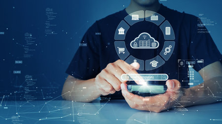 A person is connecting to the Internet through a smartphone to access cloud computing technology...