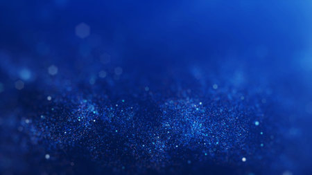 Abstract blurred sparkling or glittering particles on dark blue background.の写真素材