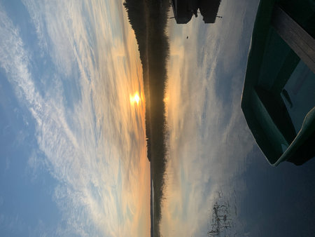 Reflection of the sun on the water in the river, Thailand.の写真素材