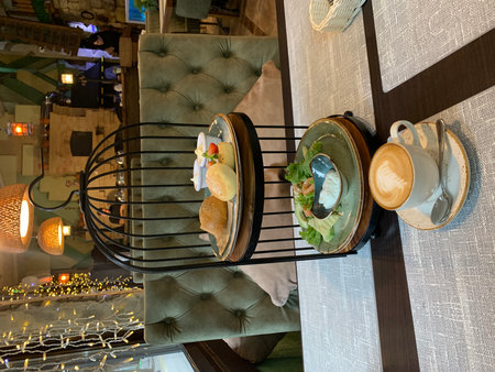 Restaurant cafe interior with crockery and saucersの写真素材