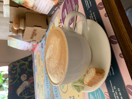 Coffee cup and saucer on shelf in coffee shop.の写真素材
