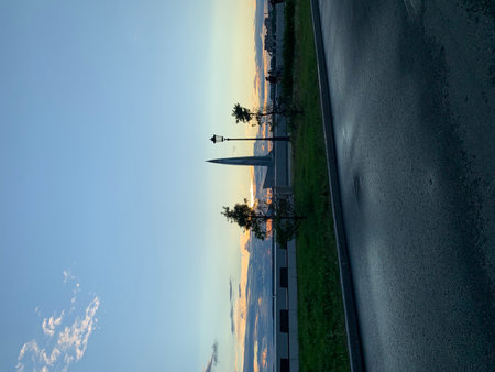 Asphalt road and blue sky with clouds at sunset. view from above.の写真素材