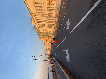 The road is marked with a red traffic sign on the street.の写真素材