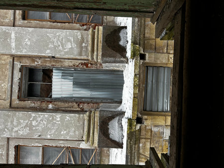 Windows of an old building in the abandoned city of SPBの写真素材