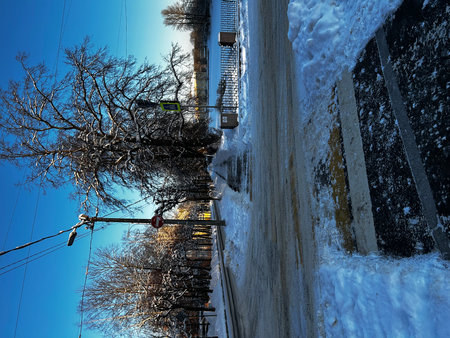 Snowy street in the city in winter.の写真素材