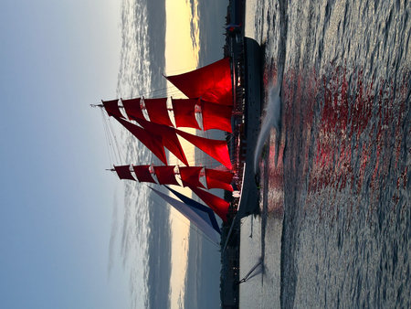 Sailing ship at sea with red sails on a sunny day. Scarlet Sails, Saint Petersburgの写真素材