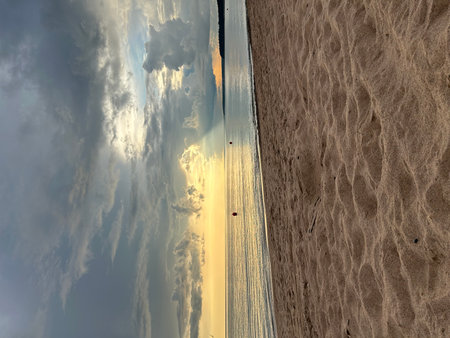 Reflection of the sky and clouds on the sand of the beach. Solnechnoe, Saint Petersburg, Laskoviy beachの写真素材