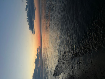 Sunset on the sea in the winter. View from above.の写真素材