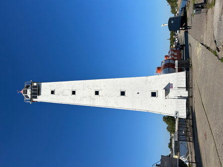 A high angle shot of a building with a blue sky in the background. Kronstadt, St. Petersburg, lighthouseの写真素材