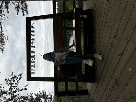 young beautiful hipster woman relaxing at modern wooden house in the countrysideの写真素材