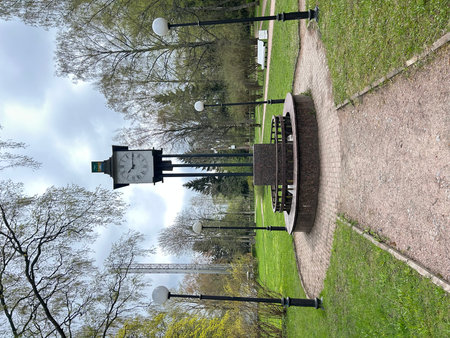 Aerial view of a park with a clock and pathways.の写真素材