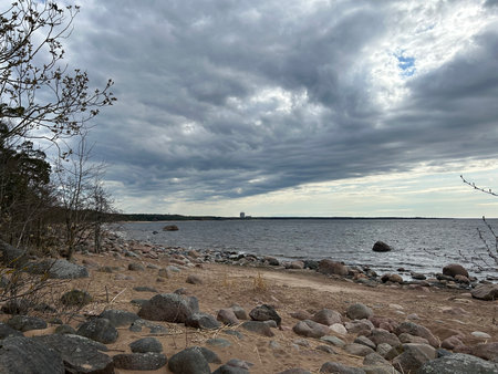 Baltic sea shore under a cloudy sky after a thunderstorm.の写真素材