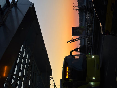Silhouette of a tramway at sunset in Hong Kong.の写真素材
