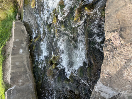 Waterfall in the mountains. Mountain river. Waterfall in the mountains.の写真素材