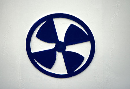 Warning sign for bow propeller on a ferry in a Danish portの写真素材