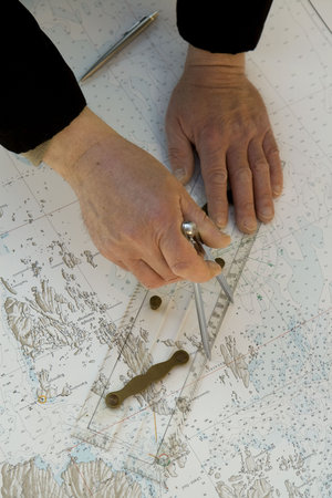 Navigator measuring a distance in a chartの写真素材