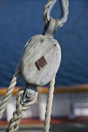 close up on a tackle on a small sailing ship