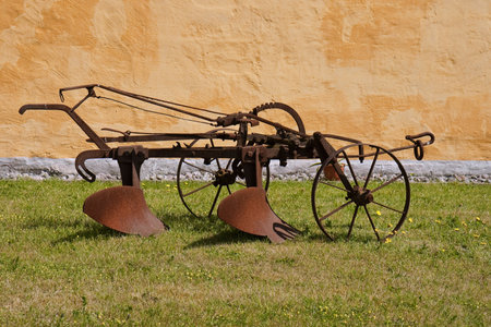 Old plow at a farm at Mols, Denmark