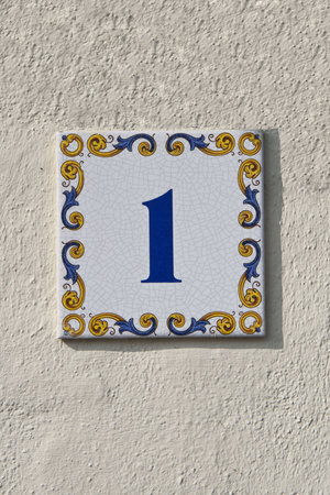 House number 1 on a plastered wallの写真素材