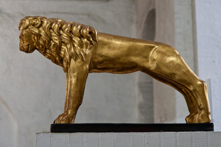 Statue of golden lion  Shot from the cathedral in LÃ¼beck, Germanyのeditorial素材
