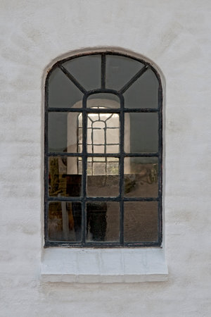 Closeup on a pair of old church windows