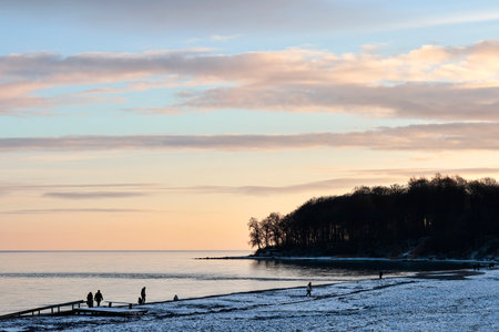 Sunset at the beach at wintertime.の写真素材