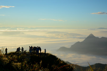 Mountains covered by mist in the morning before the sun is up, a beautiful view. In the winter,...