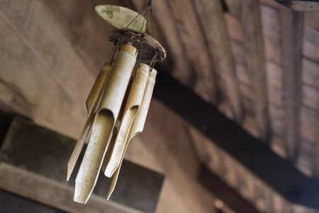 Old bamboo bell hanging at homeの写真素材