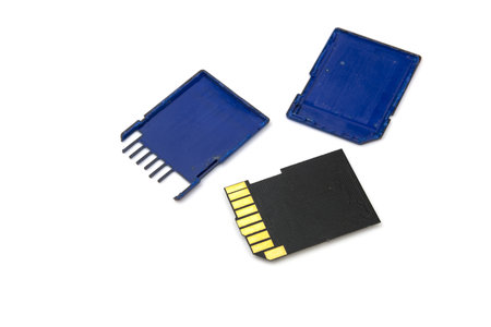 broken digital camera memory card on white background
