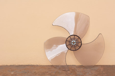 dirty electric fan blade prepare to clean for maintenance concept.の写真素材