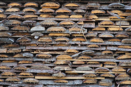 Sawn and neatly stacked pile of pine boards. Texture, backgroundの写真素材