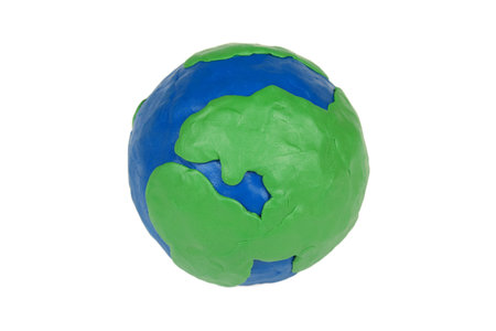 Model of the globe, made of clay, on white backgroundの写真素材