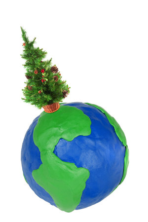 Festive Christmas tree and globe on white backgroundの写真素材