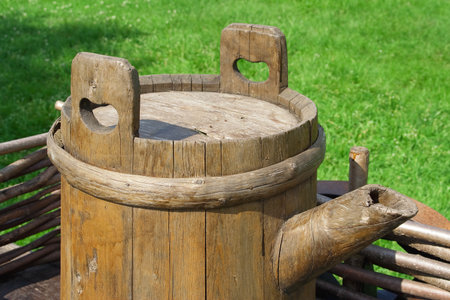 The barrel, standing on a cart, which serves to transport waterの写真素材