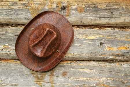 Leather hat hanging wall of a village house  Texture, backgroundの写真素材