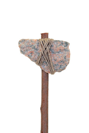 A miniature model of prehistoric stone ax. Subject, isolatedの写真素材