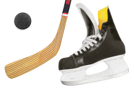 Hockey skates, stick and puck 