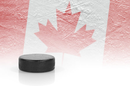 Hockey puck and a Canadian flag image. ?onceptの写真素材