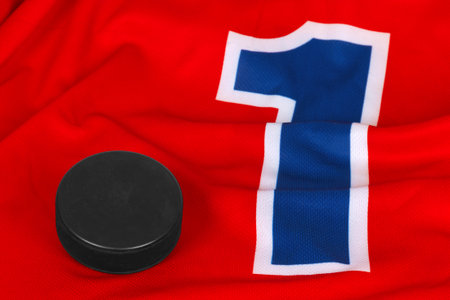 Hockey sweater with a the number one and the puck. Texture, backgroundの写真素材