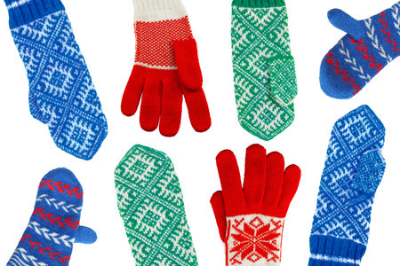 Wool knitted winter mittens on a white backgroundの写真素材