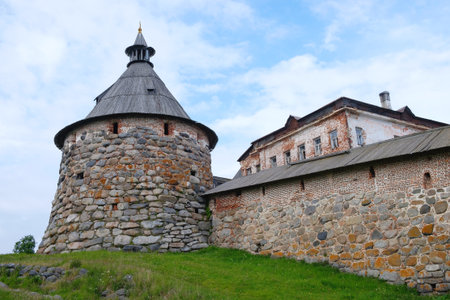 Ancient monastery tower with walls and buildings. Architecture, exteriorのeditorial素材