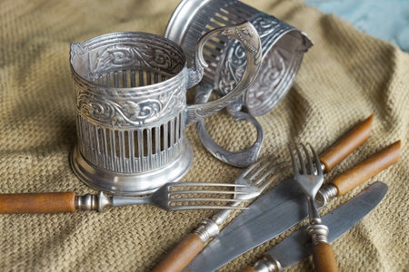 Ancient utensils on the table. Texture, background, exteriorの写真素材