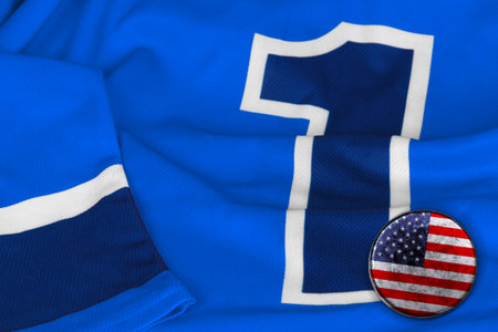 American puck and a hockey jersey with the number one. Texture, backgroundの写真素材