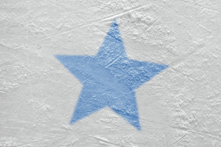 Blue star on the ice hockey arena. Concept, hockey, background, sign, symbolの写真素材