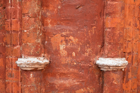 Brick fragment of the wall of the monastery building. Architecture, exterior, background